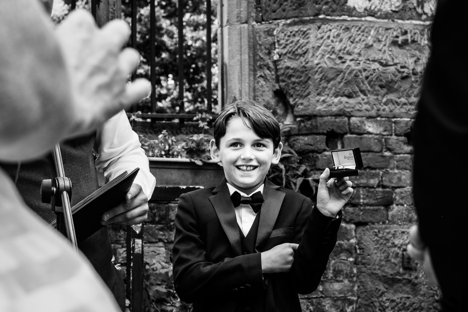 Page boy shows the ring at St Luke's Bombed Out Church wedding