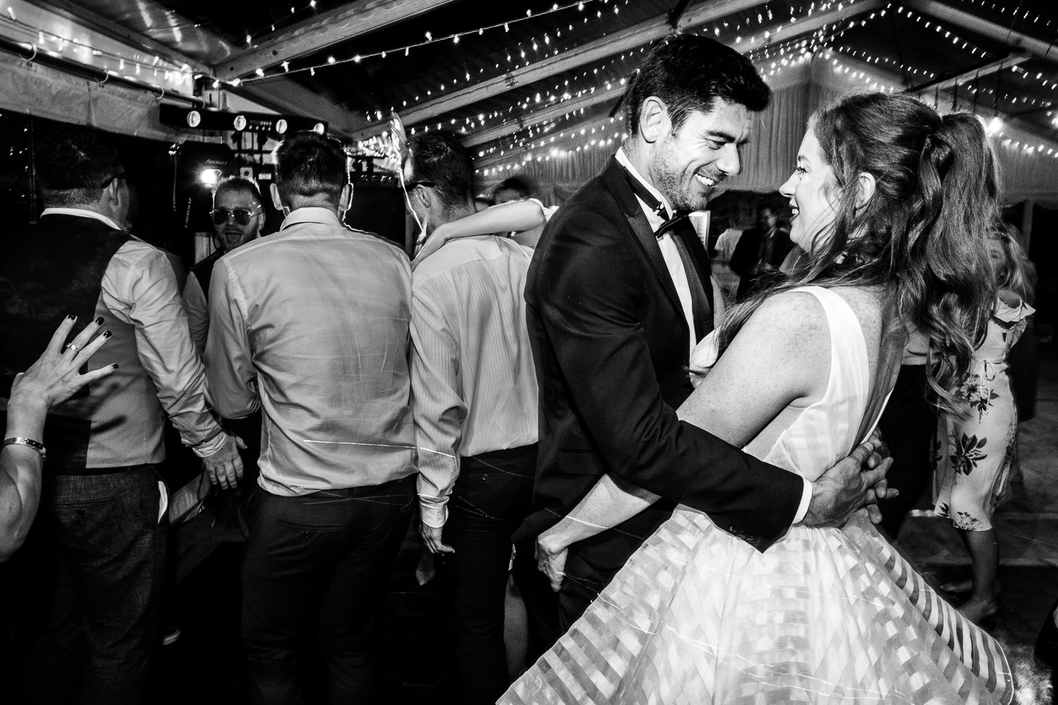 Bride and groom dancing at St Luke's Bombed Out Church wedding