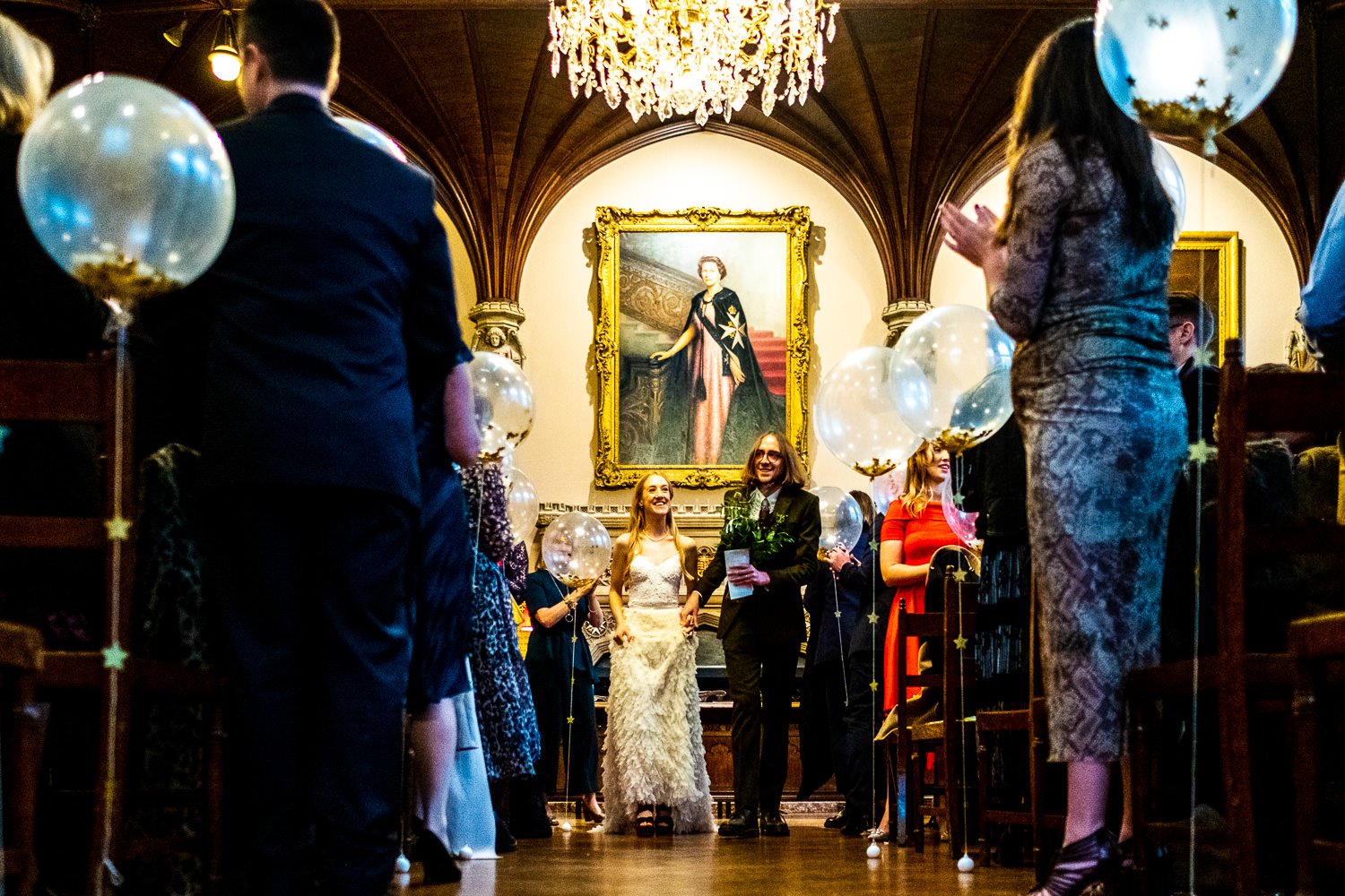 Bride and groom walk down the aisle at Museum of Order of St John wedding in London