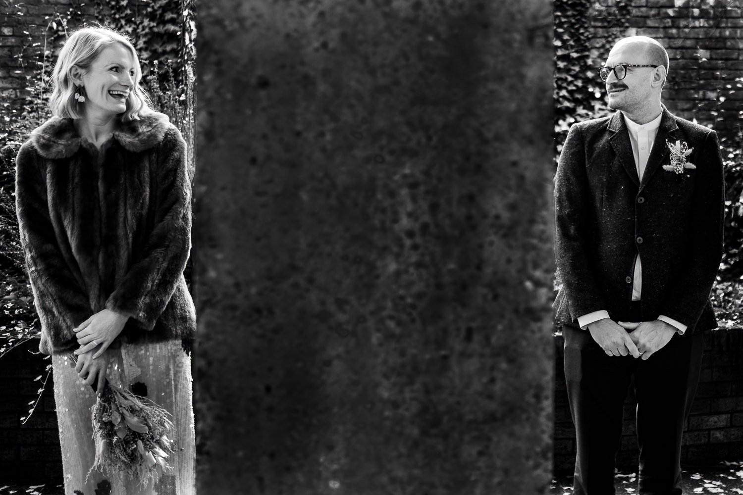 Bride and groom pose for a portrait after their Stockport Town Hall wedding