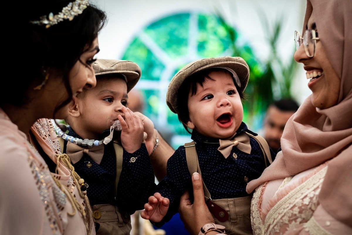 Guests with their children at a Cheshire garden wedding