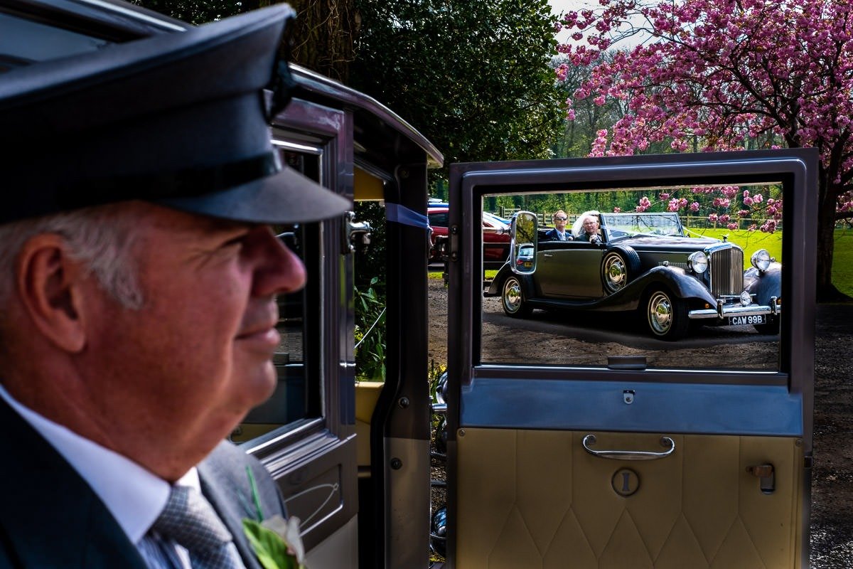 Bride and groom arrive at Singleton Lodge for their wedding reception