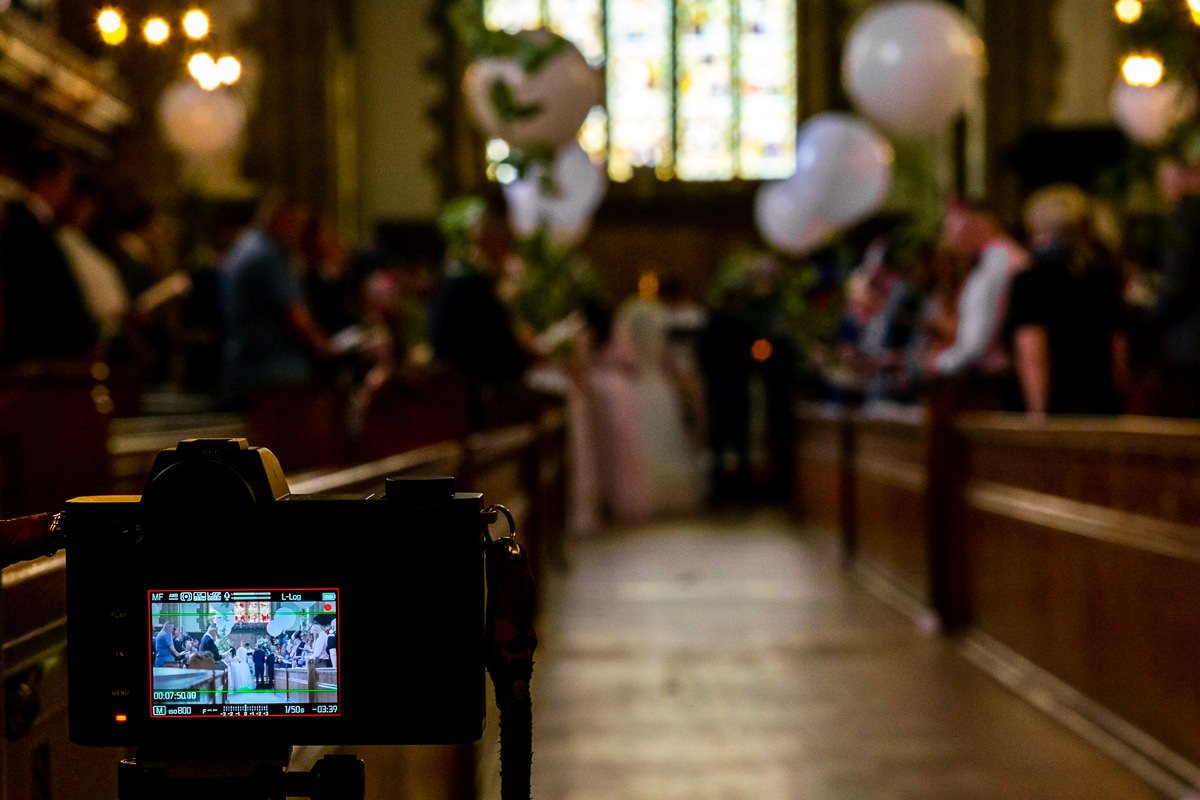 A video films a wedding ceremony at Rossall School in Lancashire