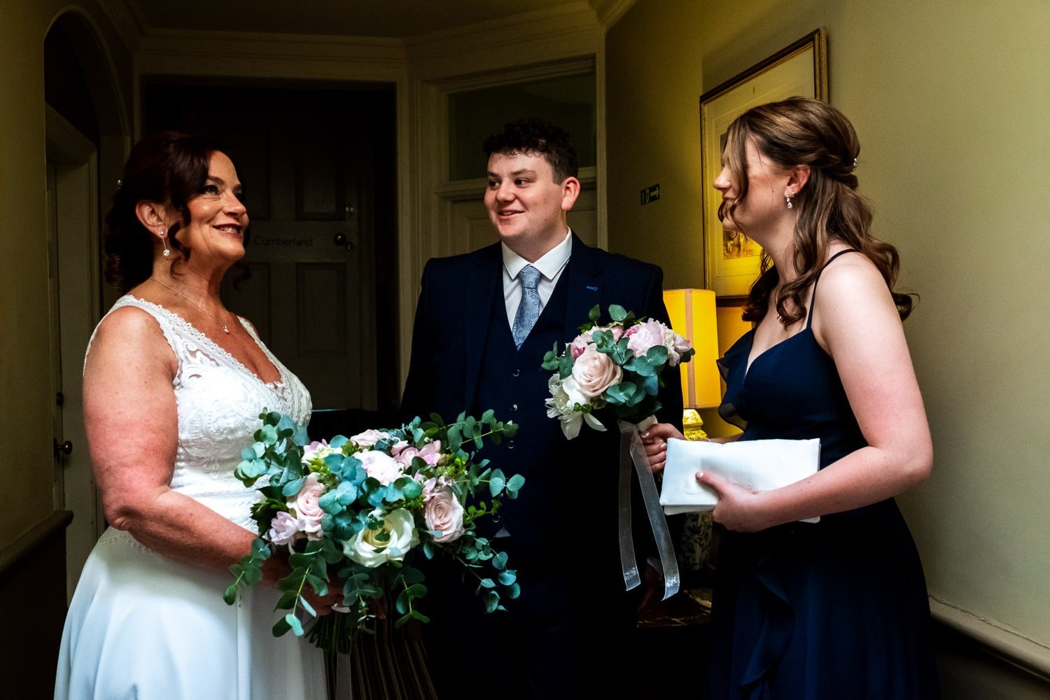 Bride, son and daughter smile before wedding ceremony at Grays Court in York