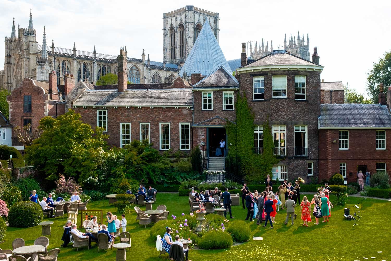 Guest dance at Grays Court with York Minster in the background