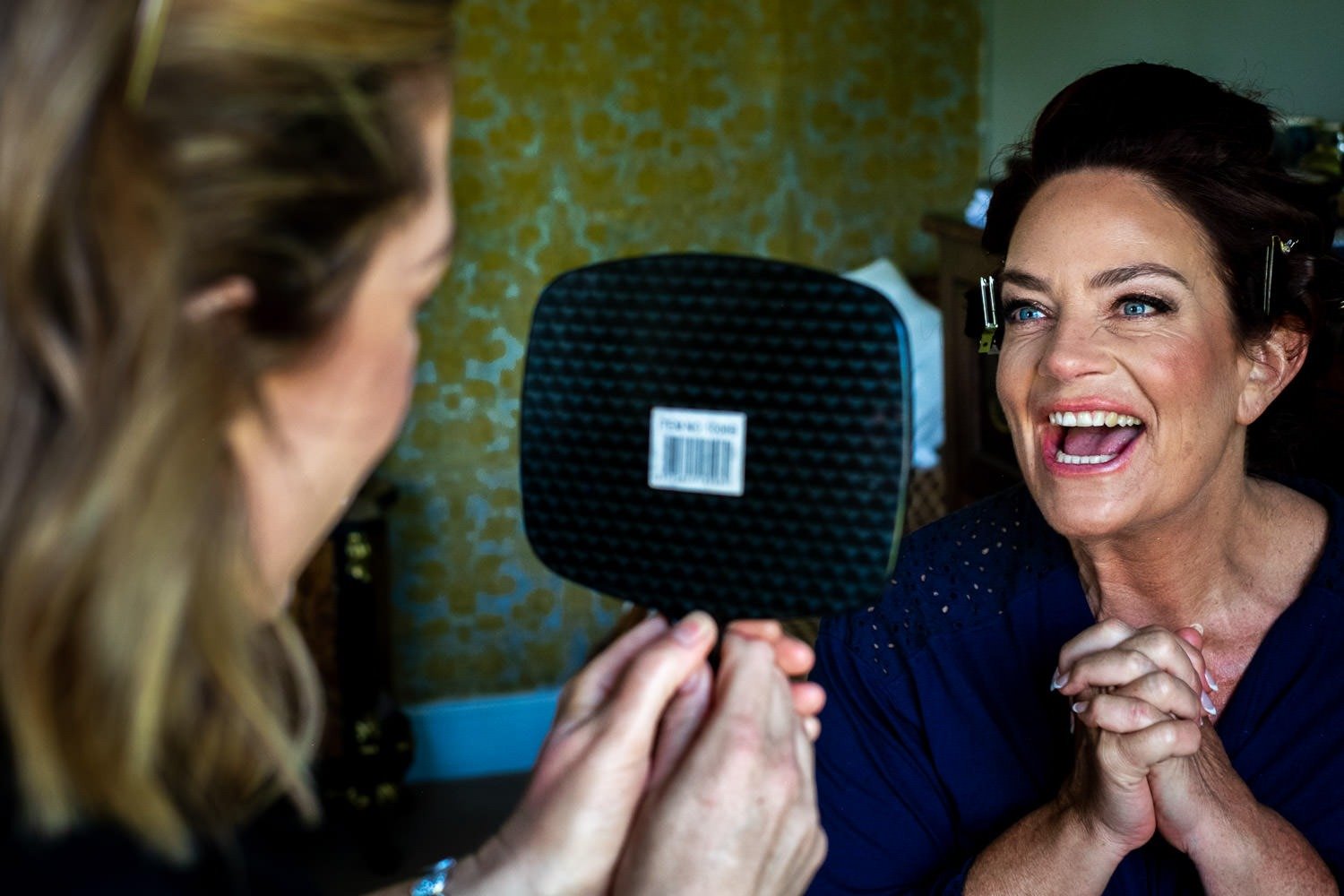 Bride smiles during bridal prep at Grays Court