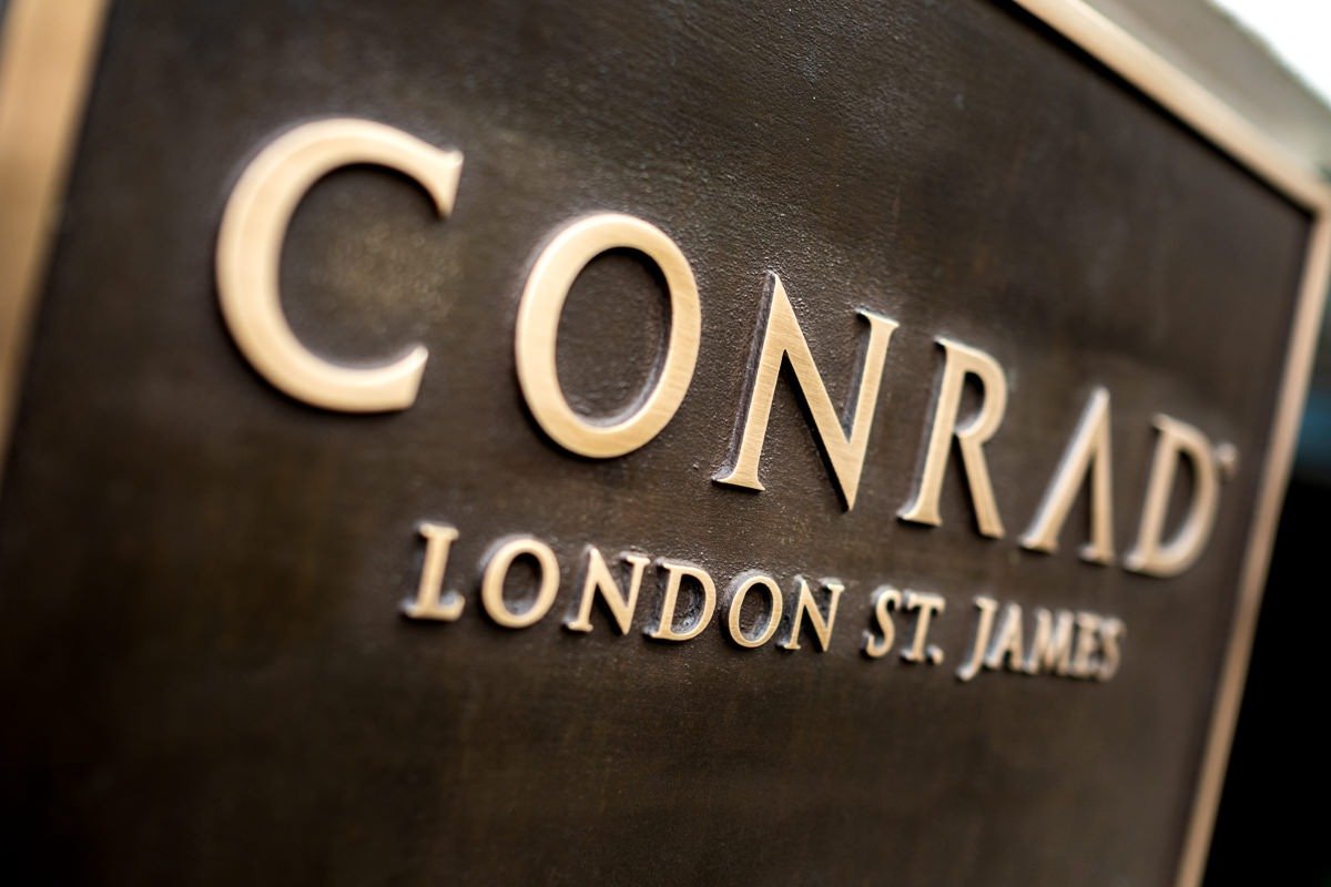 Close-up of Conrad St James hotel sign