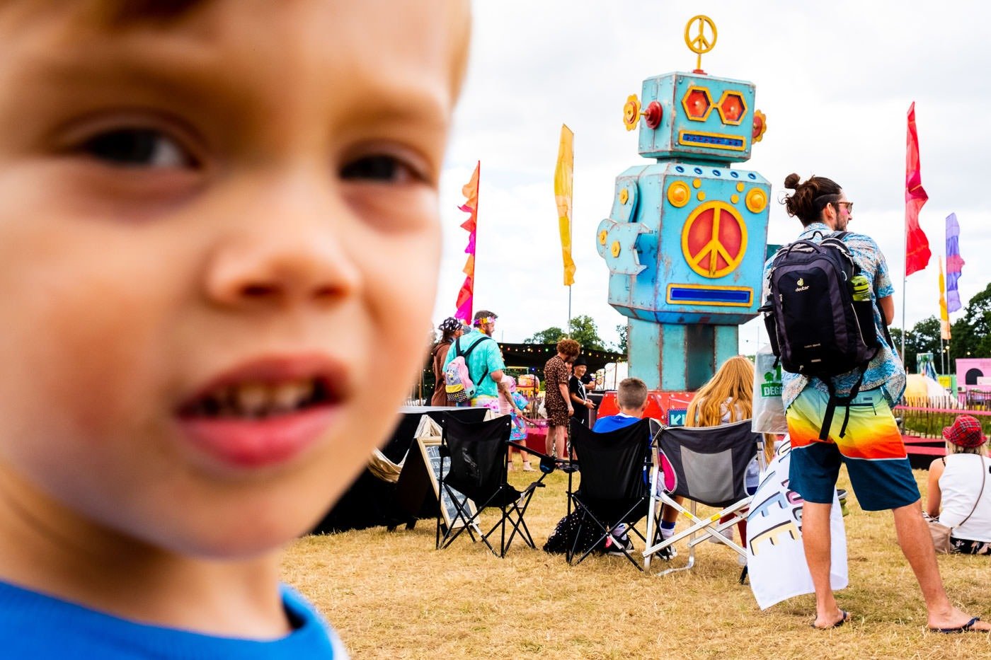 Child and robot at Camp Bestival