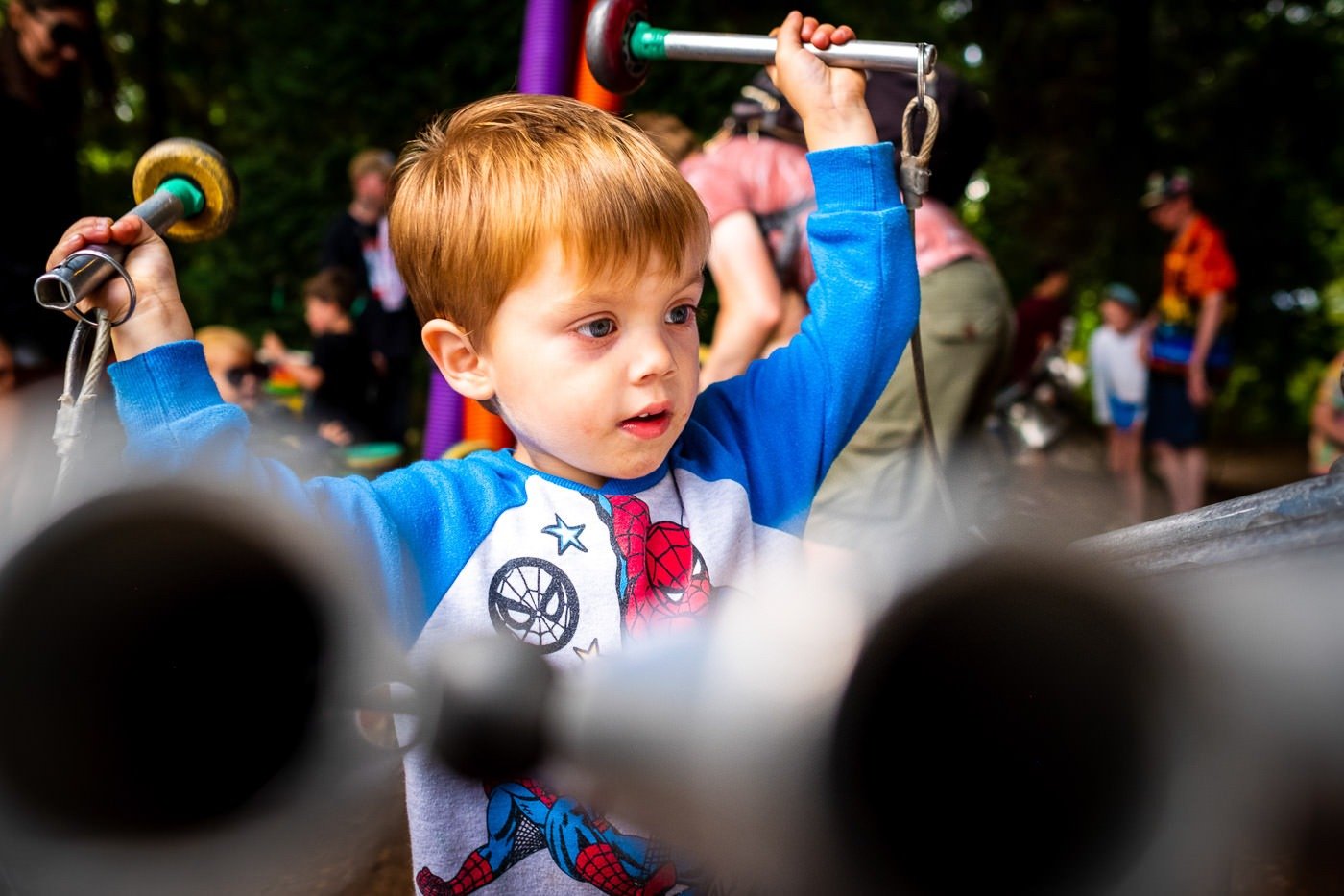 Child plays musical instruments at Campo Bestival