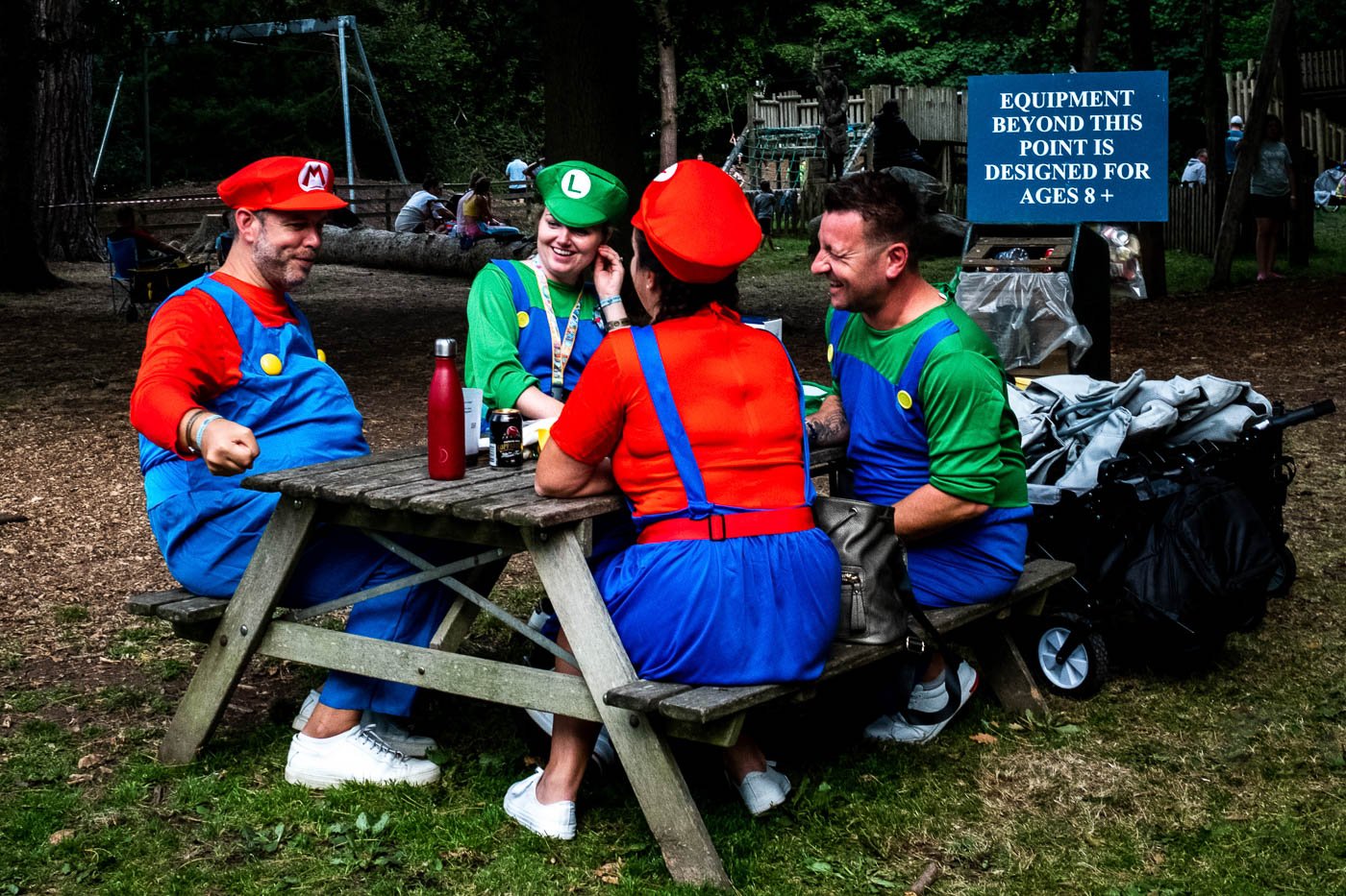 People wearing Mario Bros fancy dress at Camp Bestival