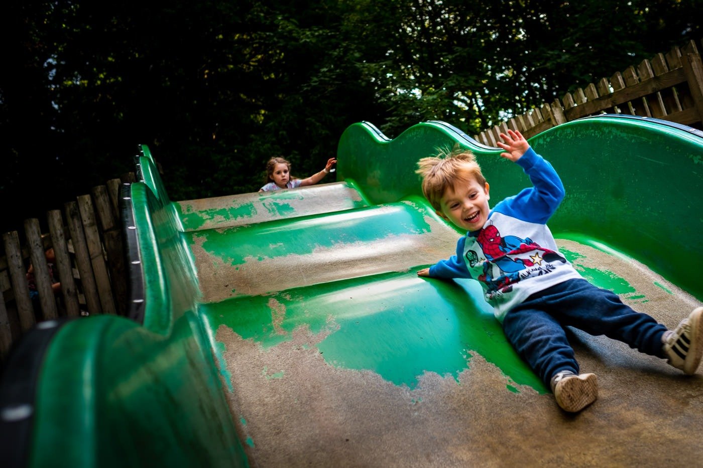 Child plays on a slide at Camp Bestival