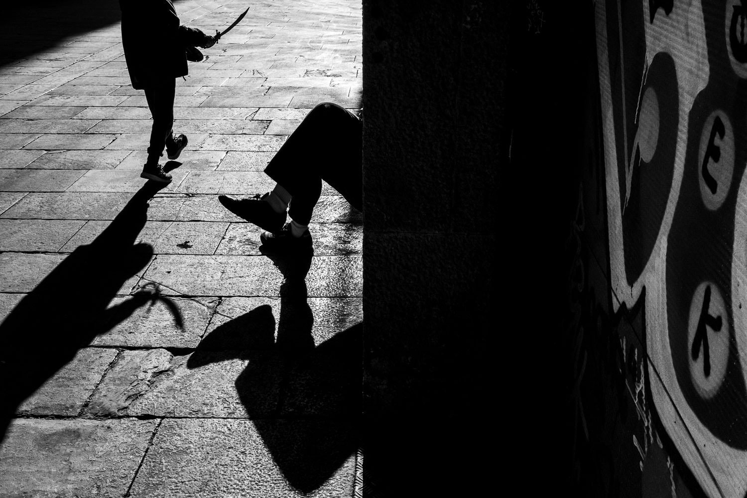 Silhouette of child with toy sword