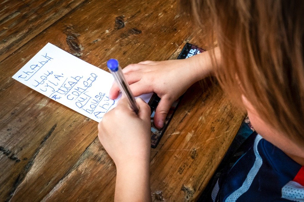 Child writing a note